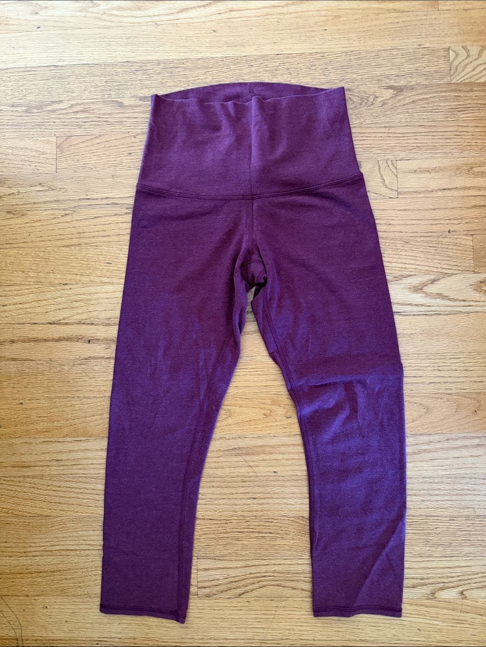 Lululemon leggings in a heathered berry color